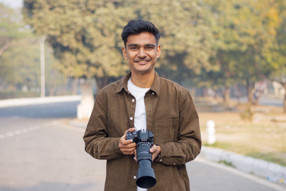 Wedding photographer holding a professional camera