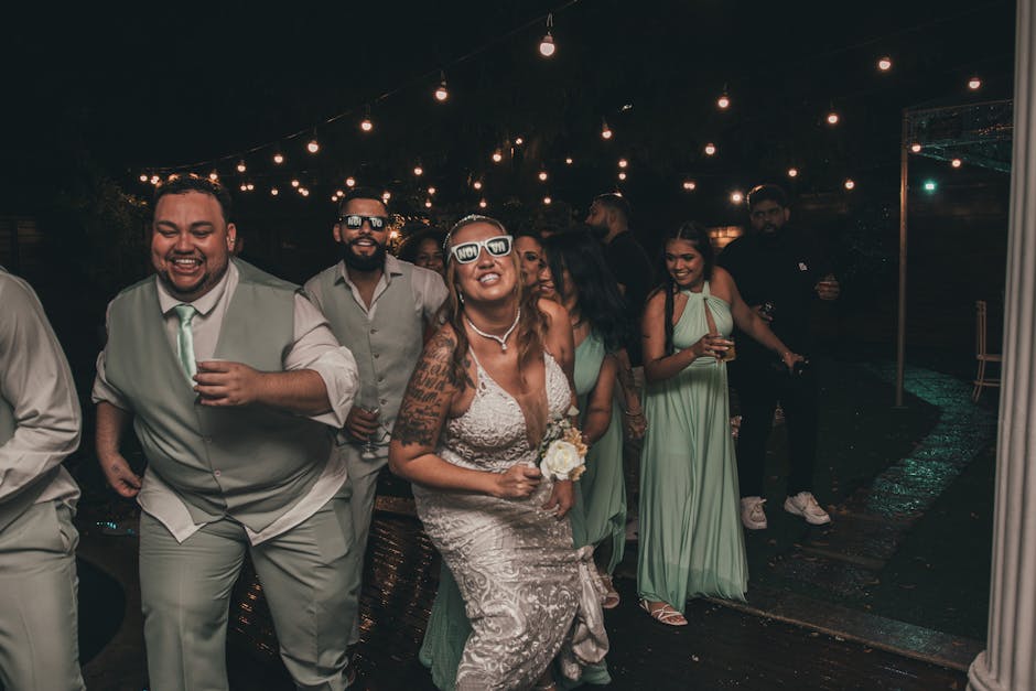 Candid moments of guests dancing at reception